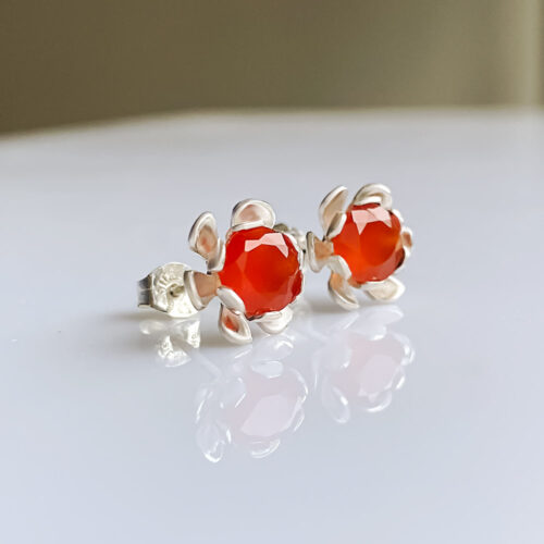 Petals opens every so slightly to reveal the gem in Spring Blooms in Carnelian Earrings from INIZI by Christina