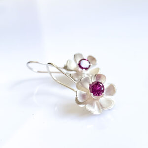 A unusual pop of colour in these floral earrings by Christina of INIZI Jewellery