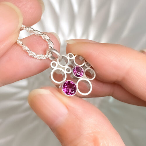 Circling to Infinity with Rhodolite Garnet Pendant Necklace